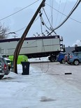 An oversized load caught a power line on Sherridon Drive near 99 Ave on Monday, Jan. 17. Photo via Facebook.