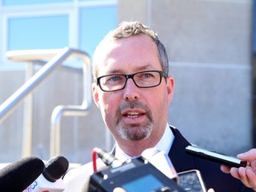 Michael Lacy, lawyer for Gerry Lougheed Jr., addresses the media outside the Sudbury Courthouse on April 27, 2016. Ward 2 Coun. Michael Vagnini has hired Lacy to represent him. Ward 11 Coun. Bill Leduc is alleging Vagnini threatened him last week.