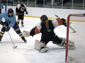 Emma Sharp, shown in action last season against North Park Collegiate, is a key player for Assumption College's girls hockey team. Expositor file photo