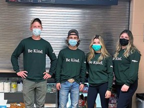 Ben Gammon (left), Maddow Matheson, Brie McAllister and Shelby McColl remind Brant County residents to "Be Kind" as municipal facilities, including the Brant Sports Complex and Syl Apps Community Centre, reopen. Submitted