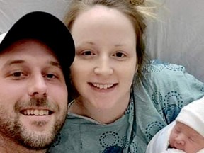 The Brockville area's first baby of the year, Davis Perrin, is shown with mom Hayley Latulippe and dad Joshua Perrin on New Year's Day. (SUBMITTED PHOTO)