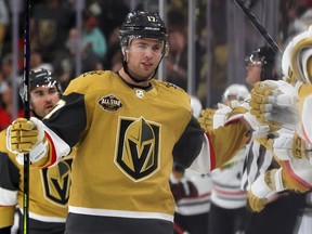 Vegas defenceman and Augusta Township native Ben Hutton is congratulated by teammates after scoring his first goal as a Golden Knight on Saturday, Jan. 8.
Ethan Miller/Getty Images