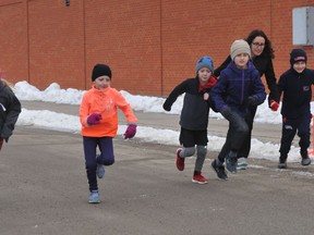 Youngsters get moving at the start of the 1-km Freeze Your Buns race in front of the Brockville Memorial Centre in late January 2020. The 2022 edition of the three-event series staged by the Brockville Road Runners Club will be virtual.
File photo/The Recorder and Times