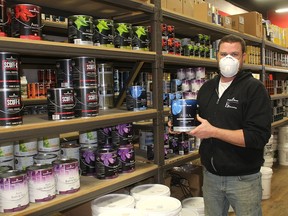 Nick Fryer, manager of Fx Decorating Warehouse in downtown Chatham, said business is booming to the point it has been a challenge to get enough paint in to meet the demand. Ellwood Shreve/Postmedia