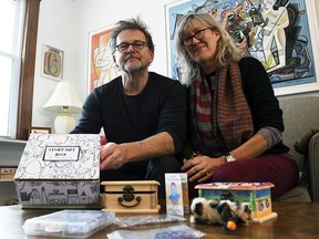 Matthew Giffin, left, and Cheryl Thornton, founders of StoryValues, Inc., display a new project they worked on with The ArtLab from Windsor called The StoryArt Box of Imagination inside their Ridgetown home Jan. 18, 2022. These boxes combine folklore with art projects. Tom Morrison/Chatham This Week)