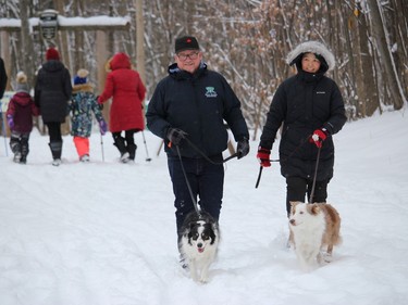 Ron and Mia Edwards, with Lexi (left) and Ace, out for a walk Sunday afternoon in the very popular Summerstown Forest. Photo on January 2, 2022, in Summerstown Station, Ont. Todd Hambleton/Cornwall Standard-Freeholder/Postmedia Network