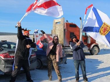 Cody Ward (left) and friends, all of Nova Scotia, in a parking lot at Herb's Travel Plaza. Photo on Friday, January 28, 2021, in Vankleek Hill, Ontario.Todd Hambleton/Standard-Freeholder/Postmedia Network
