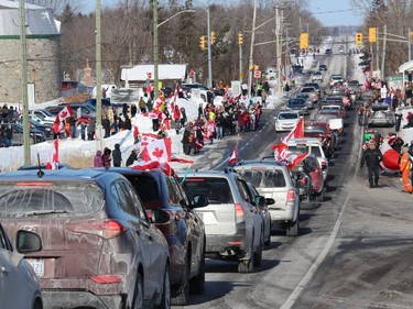 Some in the estimated crowd of over 200 in St. Andrews West, welcoming and sending off convoy participants. Photo on Saturday, January 29, 2022, in St. Andrews West, Ontario.Todd Hambleton/Standard-Freeholder/Postmedia Network