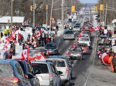 Some in the estimated crowd of over 200 in St. Andrews West, welcoming and sending off convoy participants. Photo on Saturday, January 29, 2022, in St. Andrews West, Ontario.Todd Hambleton/Standard-Freeholder/Postmedia Network