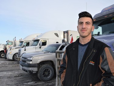 Artur Pulatov of Toronto could not attend Ottawa for the Freedom Convoy but was happy that he was able to make a stop in Cornwall and show his support among fellow truck drivers on Saturday January 29, 2022 in Cornwall, Ont. Shawna O'Neill/Cornwall Standard-Freeholder/Postmedia Network