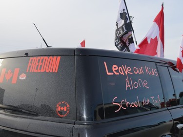 Vehicles displayed various flags and anti-mandate slogans in support of the Freedom Convoy on Saturday January 29, 2022 in Cornwall, Ont. Shawna O'Neill/Cornwall Standard-Freeholder/Postmedia Network