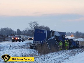 A crash involving a pickup truck and transport truck closed the Highway 402 in both directions near Glendon Drive Thursday, police said. (OPP supplied photo)
