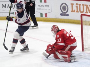 Soo Greyhounds goalie Samuel Ivanov makes a save on a Evan Klein redirect as the Hounds picked up a 5-1 win over the Saginaw Spirit on Wednesday night at the downtown rink. Ivanov picked up his 15th victory of the season in the four-goal victory.