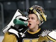 Kingston Frontenacs goaltender Leevi Merilainen takes a drink of water during a break against the Sudbury Wolves during Ontario Hockey League action at the Leon's Centre in Kingston on Friday, Jan. 14, 2022. Ian MacAlpine/The Kingston Whig-Standard/Postmedia Network
