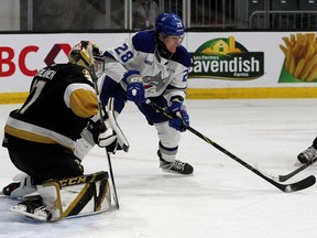 Kingston Frontenacs goalie Leevi Merilainen can't stop Sudbury Wolves Marc Boudreau watches his shot go into the net during Ontario Hockey League action at the Leon's Centre in Kingston on Friday January 14, 2022. Ian MacAlpine/KingstonWhig-Standard/Postmedia Network