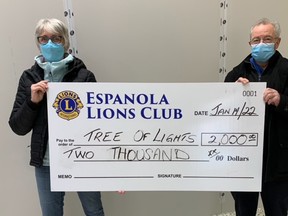 Photo by GRANT LEWIS
Mike Dubreuil, of the Espanola Lions Club, presented a cheque for $2,000 to the Tree of Lights fundraiser on Jan. 14 to Wendy Gauthier, Manitoulin Centennial Manor fundraiser.