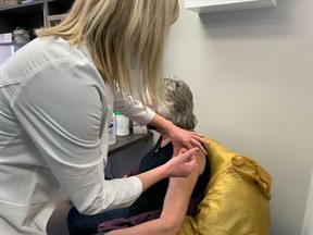 Kristie Chute, pharmacy manager at Algonquin Pharamsave on in North Bay, administers a Pfizer booster shot to a customer Thursday afternoon. The pharmacy has administered more than 2,500 COVID-19 vaccines since April.
Jennifer Hamilton-McCharles, The Nugget