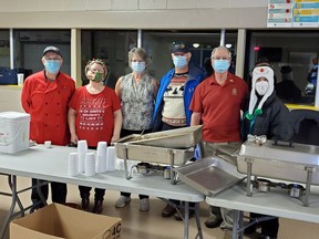 Among the volunteers helping with Petawawa's Christmas Angels Luncheon on Christmas Day were (from left) Al Freethy, Petawawa Rotarian; Elaine O'Brien, delivery co-ordinator; Joyce Serre, volunteer; Patrick Tighe, Petawawa Rotarian; Ray Serre, Petawawa Rotarian and Theresa Sabourin, co-ordinator.