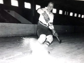 Don Stresman sprays some snow for a publicity picture with the Pembroke Little Lumber Kings during the 1951-52 season, the opening year at the PMC.