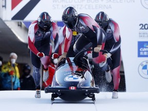 Canada's Taylor Austin, Daniel Sunderland, Chris Patrician and Shaq Murray-Lawrence in action during the Four-Man Bobsleigh at the Bobsleigh and Skeleton World Cup and IBSF European Championships in Saint-Moritz, Switzerland on January 16, 2022. REUTERS/Arnd Wiegmann