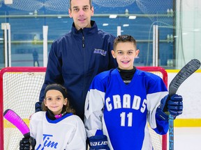 Mathieu Gentès, with his hockey playing kids, Brayden and Charlize.