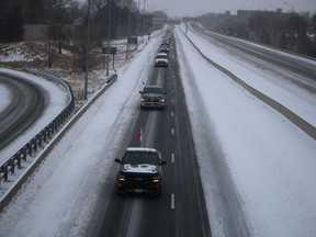 A convoy of vehicles protesting pandemic rules travels east on Highway 402 Sunday in Sarnia.