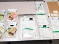 Lambton OPP said they seized more than 200 grams of cocaine and more than $5,000 in cash from a Petrolia home on Feb. 18, 2020. (Lambton OPP)