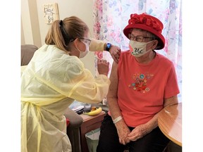 Valerie Verberg, an 88-year-old Trillium Villa nursing home resident, received her first dose of a COVID-19 vaccine on Jan. 26, 2021. (Lambton public health)