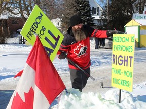 Quinton Griffin of Port Dover was one of the speakers at the Norfolk Convoy Support rally on Saturday, Jan.  29. Several hundred protesters gathered in Simcoe's Wellington Park before lining the streets to wave signs and flags.  MICHELLE RUBY/POSTMEDIA