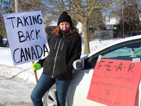 A rally in Simcoe on Saturday, Jan.  29, organized by Ashley Wills of Waterford, attracted several hundred people who protested in solidarity with a convoy of truckers and others opposed to cross-border vaccine mandates and other public health restrictions who gathered at the same time on Parliament Hill.  MICHELLE RUBY/POSTMEDIA