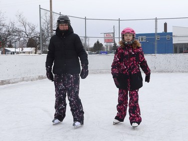 Rilynn Mack, 12, left, and her sister, Lily, 10, go for a skate at the community rink in Lively, Ont. on Tuesday January 4, 2022. John Lappa/Sudbury Star/Postmedia Network