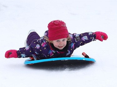 Charlee Mascioli, 3, slides down a hill in Lively, Ont. on Tuesday January 4, 2022. Wednesday will see snow and a high of -3 degrees C.  John Lappa/Sudbury Star/Postmedia Network