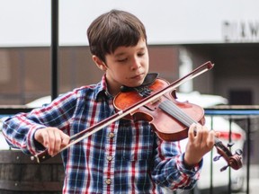 Violinist Max Gould performs during the Sudbury Symphony Orchestra tour.  Provided