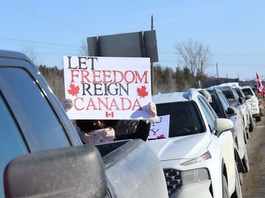 Supporters were on hand to show their support for Freedom Convoy 2022 as it passed through Sudbury, Ont. on Friday January 28, 2022. John Lappa/Sudbury Star/Postmedia Network