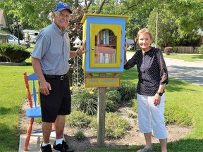 Glen and Joan Brown stand in front their Mooretown Little Free Library in July 2021. The Browns were among a growing number of homeowners in Lambton County who have constructed these little literary outposts.
Carl Hnatyshyn/Sarnia This Week