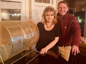 Janice McMichael-Dennis and Coun. Bill Dennis are shown with a drum used for a draw for prizes from entries of photos of backyard rinks and other winter outdoor activities. Handout