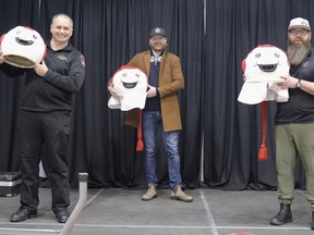 Three local men have been named as the potential inhabitants of the Bonhomme Carnaval costume for this year's winter carnival hosted by the Centre Culturel La Ronde. The mystery will be revealed on Feb. 19. From Left are Rick Lemieux of Northern College, Cameron Grant of the Timmins Chamber of Commerce, and Jonathan St. Pierre of Full Beard Brewing.

ANDREW AUTIO/The Daily Press