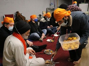 Volunteers served chai and snacks to guests at the grand opening of city's first Sikh temple held on Friday.

Dariya Baiguzhiyeva/Local Journalism Initiative