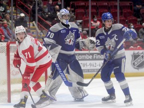 Soo Greyhounds forward Tanner Dickinson in action against Jack Thompson (#22) in OHL action earlier this year. The Hounds acquired Thompson from the Wolves on Monday morning for Marc Boudreau, Jacob Holmes and a second-round pick in the 2022 OHL draft.