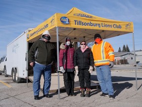 Tillsonburg Lions Club members, from left, Jim Crocker, Holly Reynolds, Kelly Oatman and Blair Oatman accepted donations at their Lions Bottle Drive on Saturday. (Chris Abbott/Norfolk and Tillsonburg News)