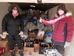 How many bottles and cans were collected at Saturday’s Tllsonburg Lions Bottle Drive? Lions Kelly Oatman (left) and Holly Reynolds can safely say ‘a lot.’ (Chris Abbott/Norfolk and Tillsonburg News)