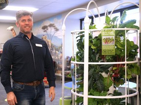 Merley Wheaton, Community Librarian at the Tillsonburg branch of the Oxford County Library, stands next to the library's new grow tower, which will be incorporated into programming this year. (Chris Abbott/Norfolk and Tillsonburg News)