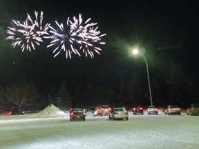 The Town of Vulcan hosted a drive-in fireworks display on New Year's Eve, with people watching the 15-minute display from the parking lot of the Vulcan District Arena. STEPHEN TIPPER