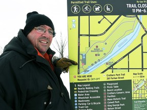 Wallaceburg resident John De Santis points to a trail map posted at Crothers Trail in Wallaceburg on Jan. 25. De Santis says he has a problem with how some trail maps in Wallaceburg are posted because they could give wrong directions.
