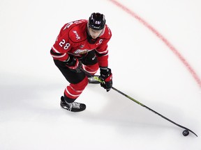 The Ontario Hockey League has suspended Attack captain Mark Woolley for his hit on Ty Voit in a Jan. 21 game against the Sarnia Sting. Tim Cornett/OHL Images