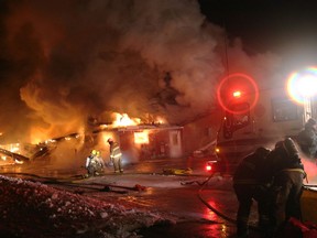 Hed: Hepworth fire

Firefighters prepare to pour water onto a south side section of the Hepworth Shallow Lake Legion building at about 5 a.m. Friday. It appeared the building, which was also home to the Bruce Grey Music Hall of Fame, could not be saved. Further details were not available at press time.
(Postmedia photo)