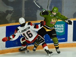 Mitchell Russell of the North Bay Battalion upends Thomas Johnston of the visiting Ottawa 67's in Ontario Hockey League play Sunday. The Sault Ste. Marie Greyhounds are at Memorial Gardens for games Thursday and Friday nights.
Sean Ryan Photo