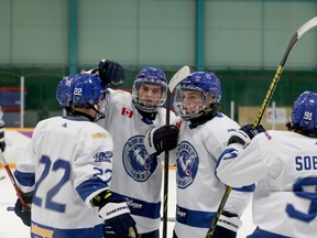 Greater Sudbury Cubs players celebrate a goal during first-period NOJHL action against the Espanola Express at Gerry McCrory Countryside Sports Complex in Sudbury, Ontario on Thursday, February 3, 2022.