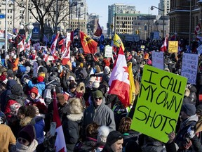 Protesters in downtown Ottawa on Saturday. PHOTO BY ERROL MCGIHON /Postmedia