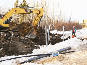Crews are pictured working on potable water pipeline installation at the end of January, in Saddle Hills County. Photo supplied